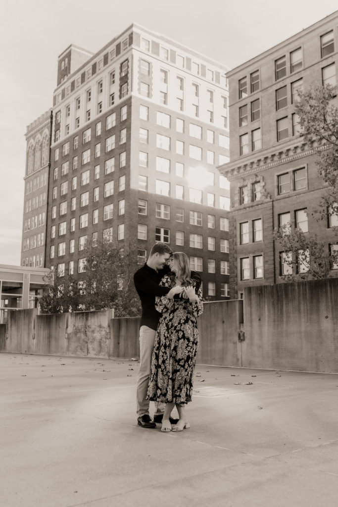 Black and White Photo of Couple Embracing during intimate engagement shoot