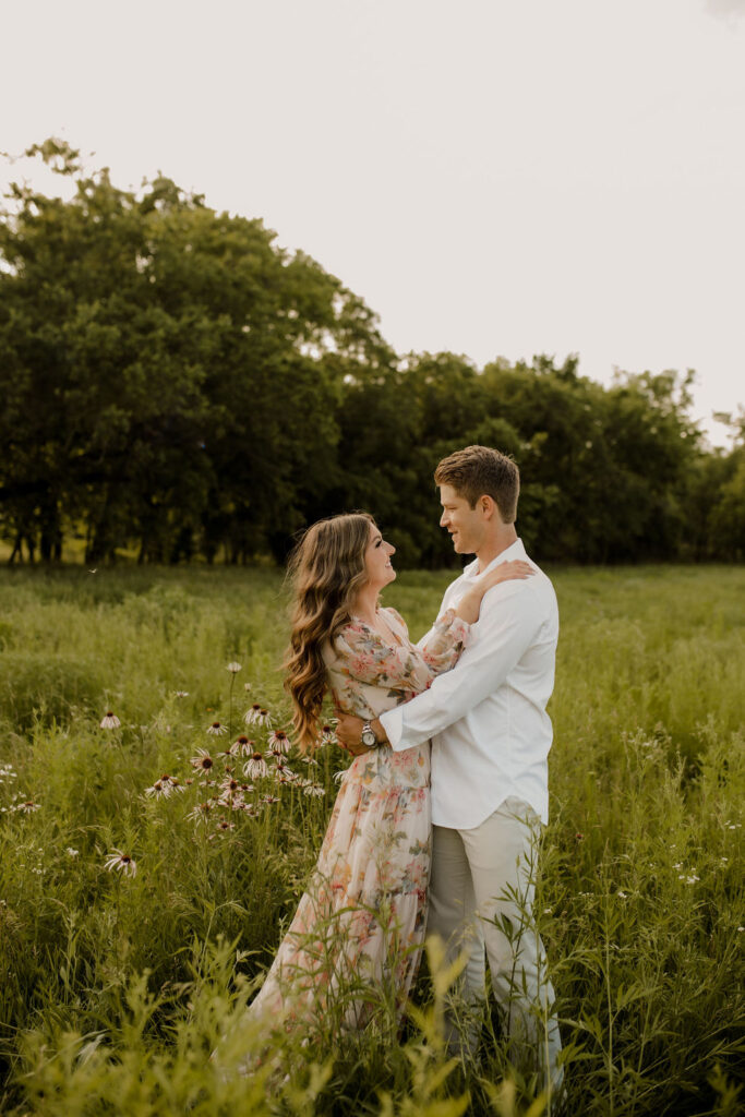 Engaged Couple in Wildflower Field in Kansas City