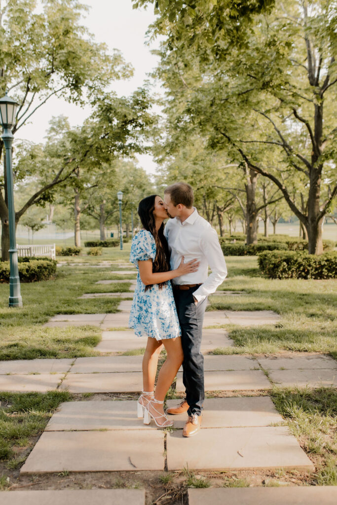 Romantic Photo of Couple Kissing in Downtown Kansas City Park
