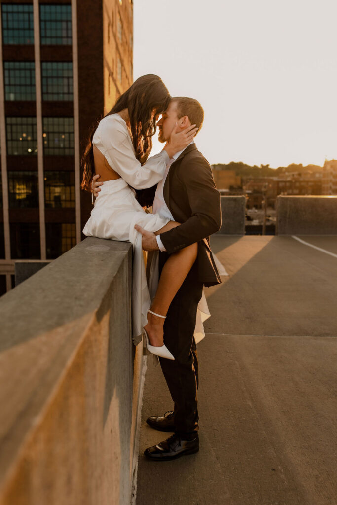 Engaged Couple on Rooftop in Downtown KC